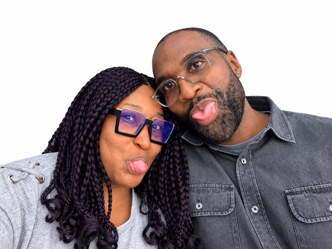 Lilian and Conrad making playful faces together